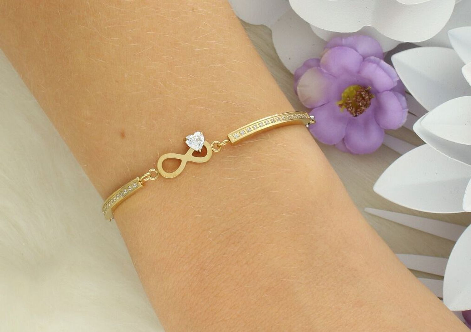 Bransoletka Nomination Italy Milleluci 028021 024 – złota z nieskończonością i cyrkoniami.jpg